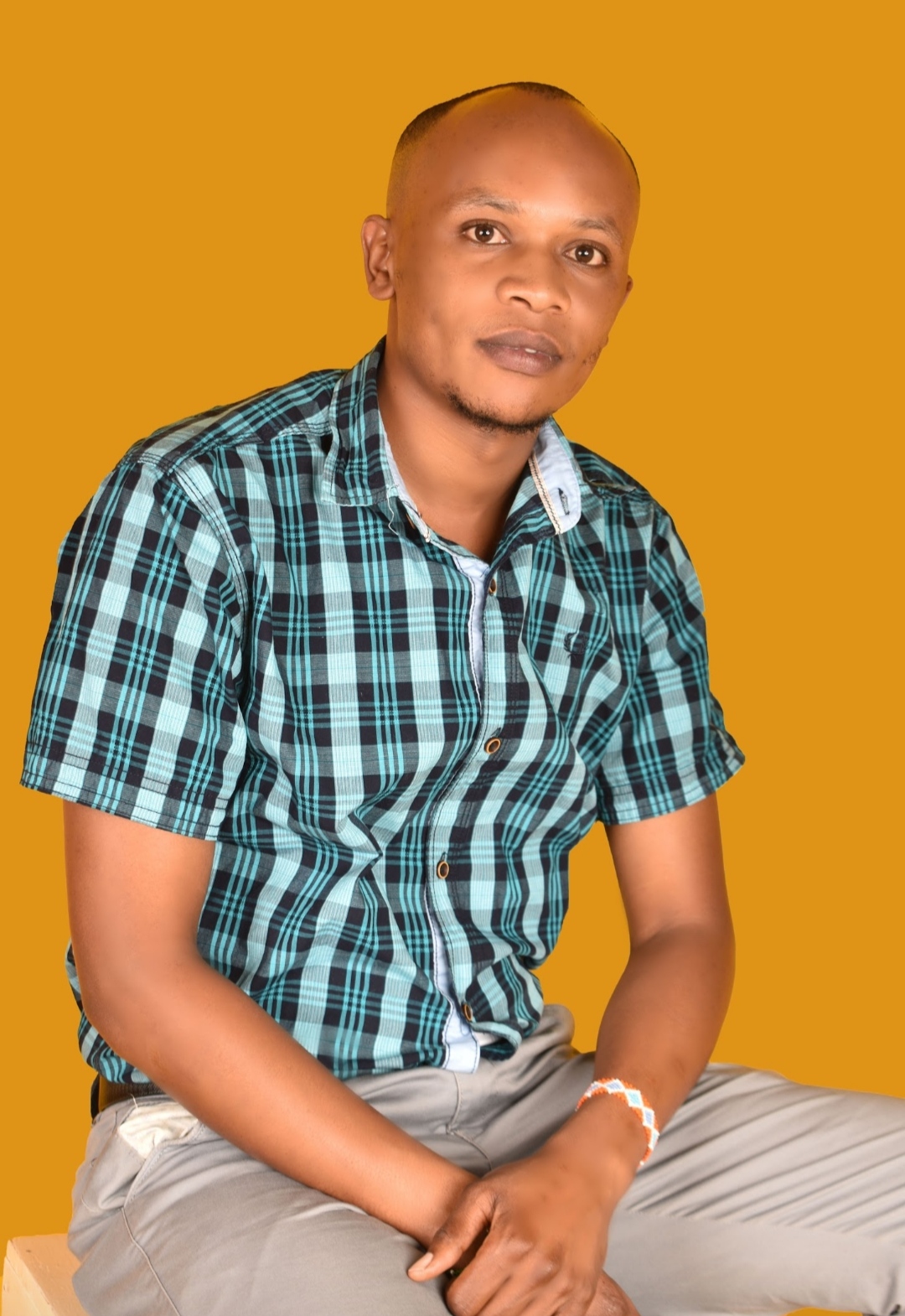 Dr. PETER MWANGI